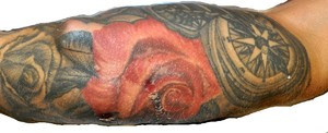 portret nn zwłok mężczyzny oraz zdjęcia tatuaży
